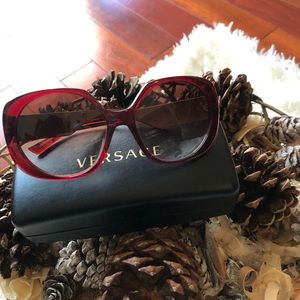 Versace transparent Red Square sunglasses.